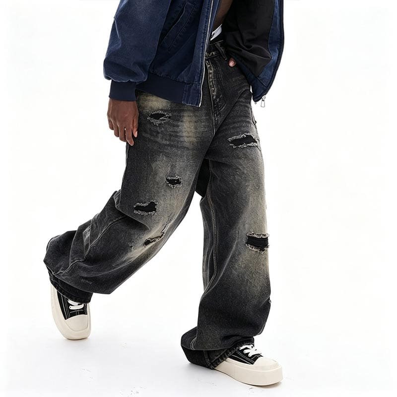 walking side model shot, custom brand logo heavy wash destroyed relaxed fitting denim pants